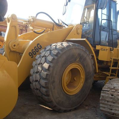 Carregador de rodas dianteiras Caterpillar 966G com 1200 horas de trabalho e 92 kW de potência